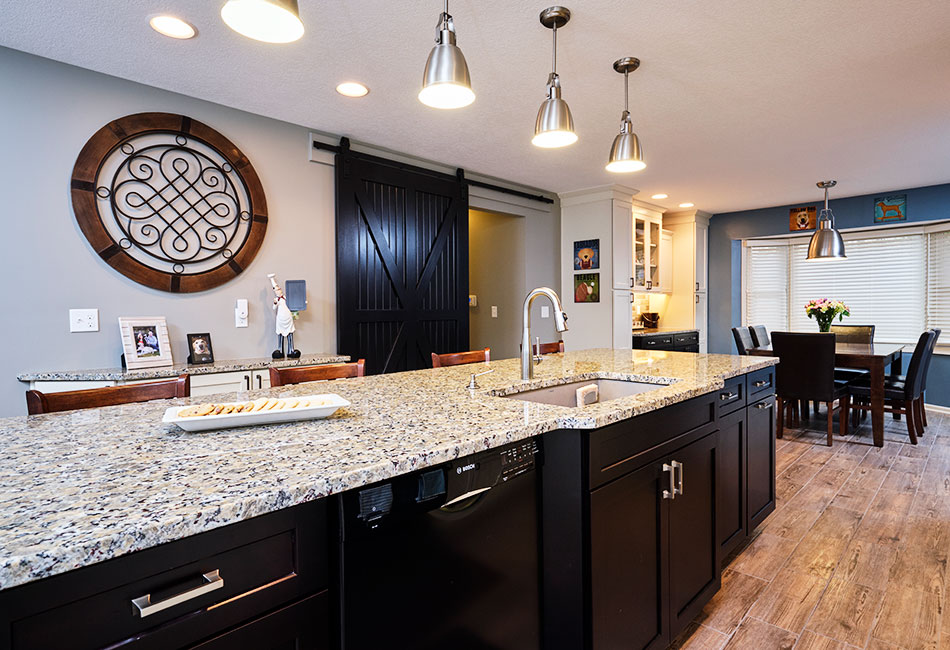 Moehl Millwork provided cabinets and countertops for this kitchen island.