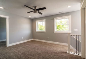 Moehl Millwork provided exterior windows and stair parts for this home project.